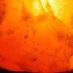 Hand-Carved Himalayan Salt Lamp with Wooden Base and Adjustable Dimmer