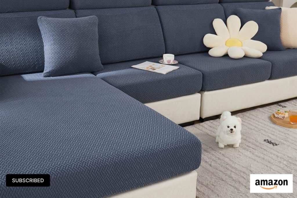 "Magic Sofa Cover in Metal Gray on a modern sectional couch"