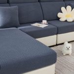 "Magic Sofa Cover in Metal Gray on a modern sectional couch"