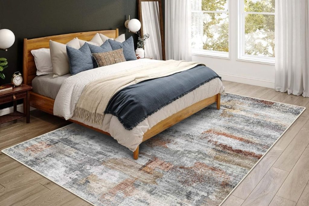 Gray and rust colored vivorug ultra soft area rug 5x7 displayed in a cozy modern living room