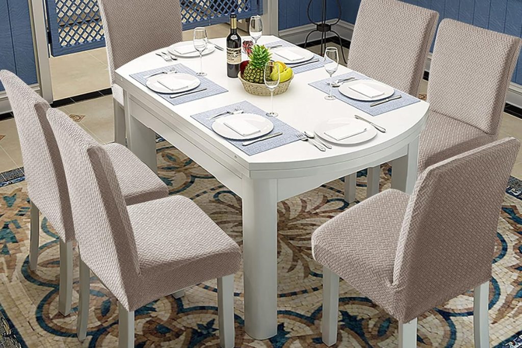 Khaki Genina waterproof chair covers on dining room chairs – stylish and protective slipcovers.