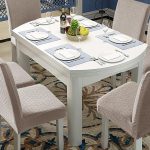 Khaki Genina waterproof chair covers on dining room chairs – stylish and protective slipcovers.