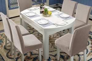 Khaki Genina waterproof chair covers on dining room chairs – stylish and protective slipcovers.