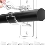 “No drill adhesive curtain rod holders in use on a living room wall – damage-free setup”
