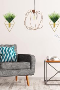 "Gold geometric wall hanging planter with artificial green plant""Set of two modern metal wall planters for living room decor"