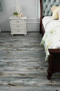 36-pack of 36"x6" peel and stick wood grain vinyl floor planks – soft, sound-reducing, and flexible for uneven surfaces, covers 54 sq.ft.