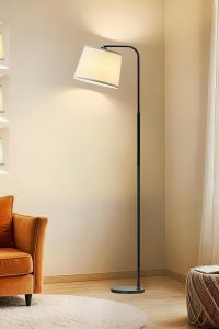 "AKASUKI arc floor lamp with curved design and LED bulb in a modern living room"