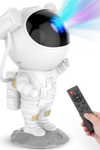"Astronaut-shaped galaxy star projector night light with LED nebula ceiling display, remote control, and timer – ideal for kids' room, birthdays, or Christmas"