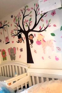 “Pink jungle animal wall decals for baby nursery with owl, giraffe, and lion”“DEKOSH peel and stick wall stickers for girls' room jungle theme”