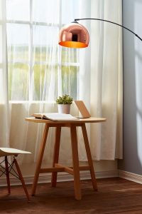 Teamson Home Arquer 66.93" Arc Floor Lamp with Rose Gold Bell Shade and Faux Black Marble Base in a Modern Living Room