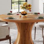 47.24-inch round brown wood farmhouse dining table with pedestal base, seats 4 to 6 people — ideal for small dining rooms or kitchens
