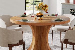 47.24-inch round brown wood farmhouse dining table with pedestal base, seats 4 to 6 people — ideal for small dining rooms or kitchens