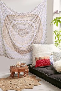 “Large Gold Mandala Tapestry 52x82 inches hanging on bedroom wall, perfect for boho, indie, and hippie room decor styles”
