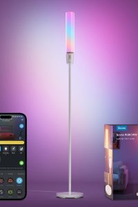 "Govee RGBIC cylinder LED floor lamp with color-changing light in a modern corner"