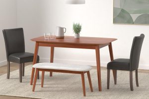 Set of 2 HomePop Parsons dining chairs with dark brown faux leather upholstery and wood legs, perfect for dining rooms, offices, or modern interiors