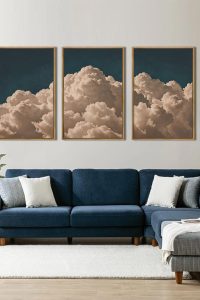 Three-panel navy blue abstract cloud canvas wall art set by IARTTOP displayed in a modern living room