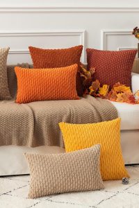 Set of 2 tan 18x18 inch soft corduroy throw pillow covers with boho striped design, perfect for farmhouse or modern home decor on couch, bed, or sofa.
