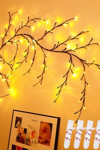 LUCKYFISH 144 LED lighted willow vine with USB power, artificial wall decor plant for home, party, and Christmas use, includes 6 Command strips for easy mounting.
