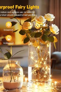 Minetom 66-foot warm white fairy string lights wrapped around a bedroom headboard