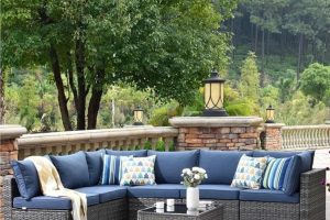 Colorful outdoor sofa decor with vibrant pillows, potted plants, and DIY lanterns in a cozy garden setting