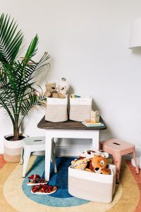 "OrganiHaus rainbow cotton rope woven storage basket, perfect for organizing toys in a nursery, storing towels in a bathroom, or decorating any room"