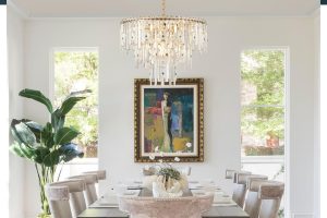 24-inch gold crystal chandelier with 3 tiers of K9 crystals and 12 E12 light bulbs – ideal for luxury dining rooms, bedrooms, or entryways