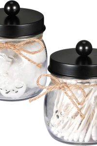 "SheeChung black Qtip holder jar with clear lid on bathroom counter"