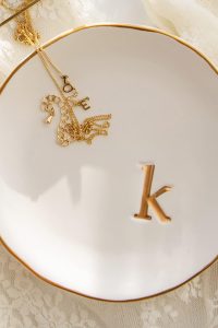 White 4.75-inch ceramic jewelry tray by COLLECTIVE HOME, perfect for storing rings, earrings, necklaces, bracelets, watches, and keys