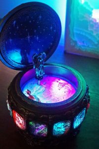 "Vintage constellation goddess music box with rotating figurine and LED lights"