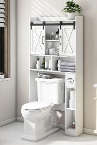 Farmhouse-style over-the-toilet storage cabinet with sliding barn doors, wood finish, and multiple shelves for bathroom or laundry organization
