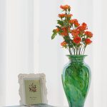 "11.5-inch hand-blown green glass flower vase with classic design, ideal for home decor, shelf styling, living room centerpiece, or thoughtful gift."