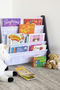 "Humble Crew 4-tier kids bookshelf with espresso wood and white fabric pockets"