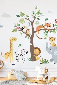Safari jungle animal wall decals with elephant, giraffe, and lion in nursery