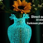 "Handmade glass flower vase with luminous waves mouth design, perfect for rustic farmhouse home decor in living room, dining room, fireplace or shelf."