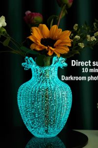"Handmade glass flower vase with luminous waves mouth design, perfect for rustic farmhouse home decor in living room, dining room, fireplace or shelf."