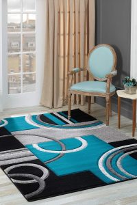 2x7 turquoise modern area rug with hand-carved pattern in hallway