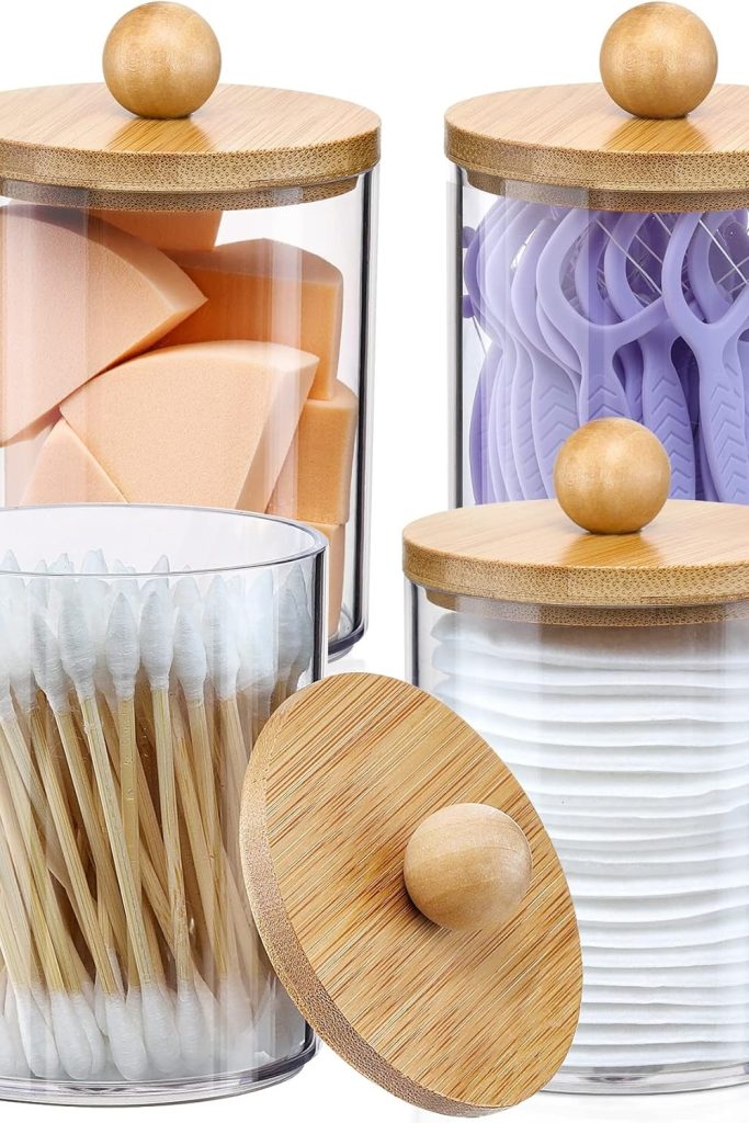 Full set of 4 jars on a vanity tray Alt text: "4-pack qtip holder set with bamboo lids displayed on a bathroom vanity"