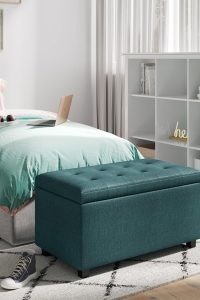 SIMPLIHOME Cosmopolitan 34-inch rectangle storage ottoman in teal polyester fabric, modern design with lift-up lid for hidden storage – perfect for entryway, family room, or living room.