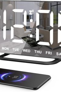 Slim LED Digital Alarm Clock with mirror surface, dimmable display, USB charging ports, and large time display – perfect for modern bedrooms or desks.