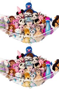 “Lilly’s Love stuffed animal hammock in nursery corner with plushies organized”