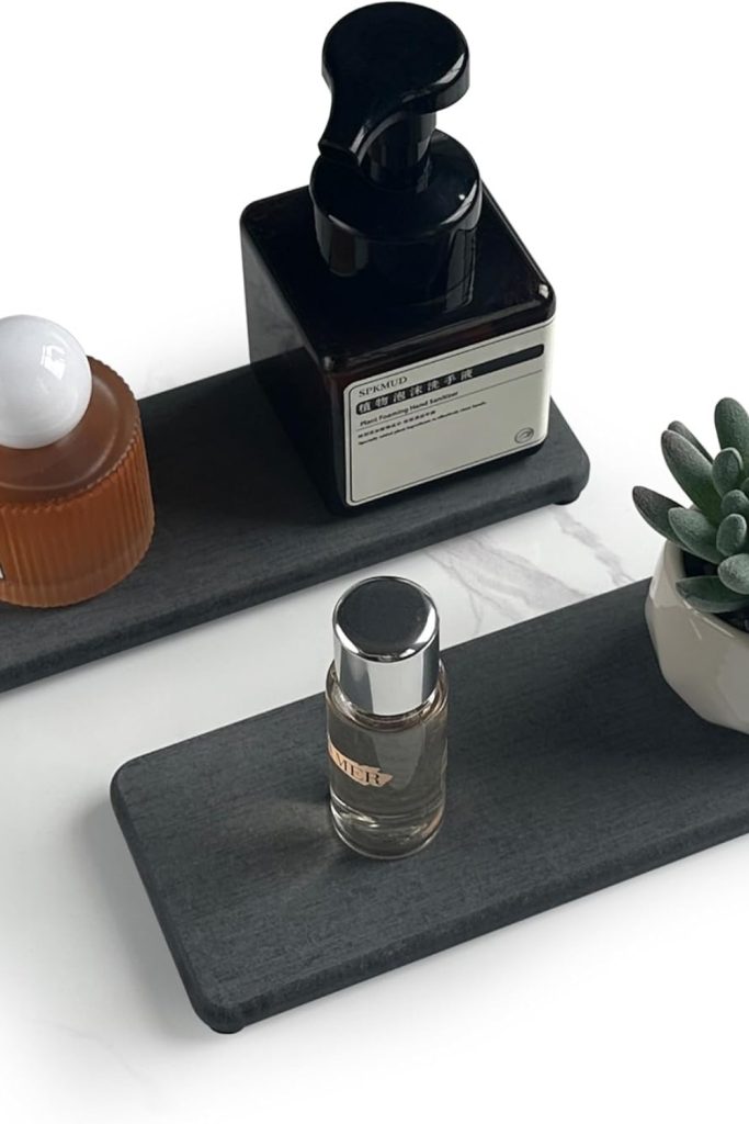 “NiuYichee diatomite water absorbing stone tray under soap dispenser”