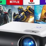 HAPPRUN Native 1080P Bluetooth projector with built-in speaker for home, bedroom, and outdoor use