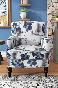 “Christopher Knight Home Boaz Fabric Club Chair in colorful floral print placed in a living room corner”