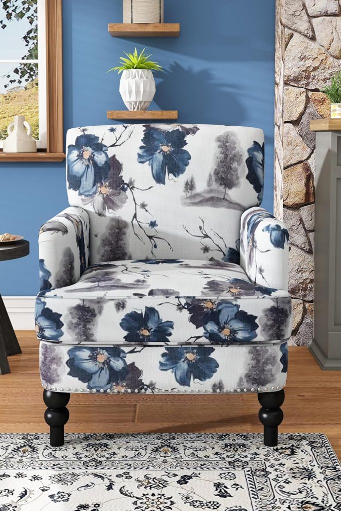 “Christopher Knight Home Boaz Fabric Club Chair in colorful floral print placed in a living room corner”