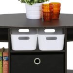 “Furinno Jaya Oval Coffee Table in Walnut finish with fabric storage bin in a modern living room”