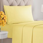 Twin XL Yellow 3-Piece Sheet Set neatly arranged on a bed
