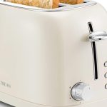 "Ultrean 2-Slice Toaster with stainless steel body and extra-wide slots on a modern kitchen counter"