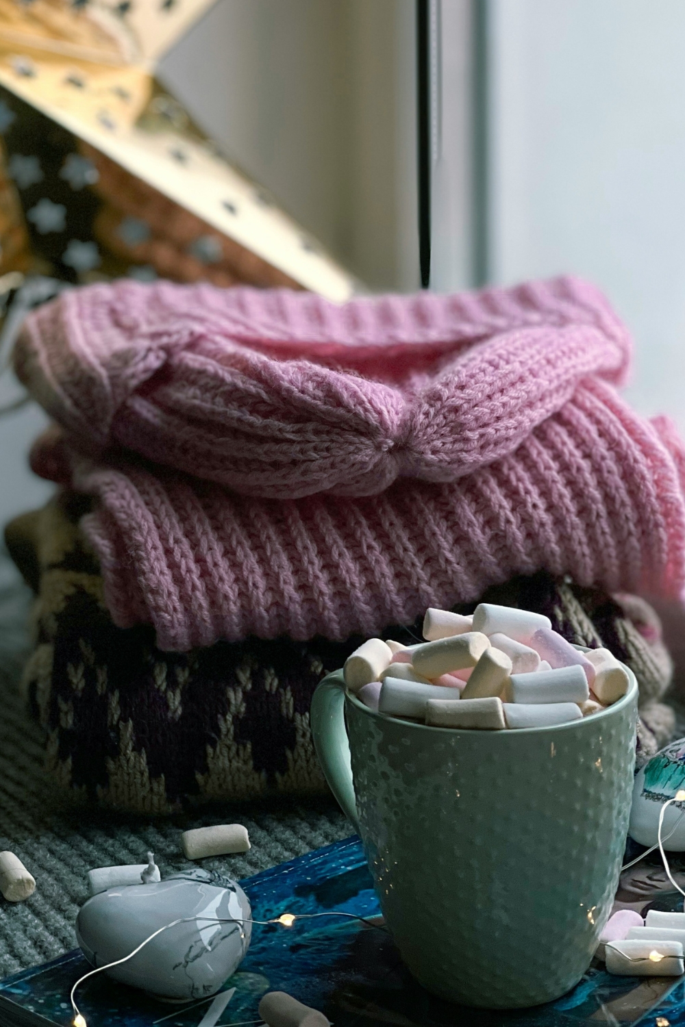 Living room with cozy throw blankets and decorative pillows