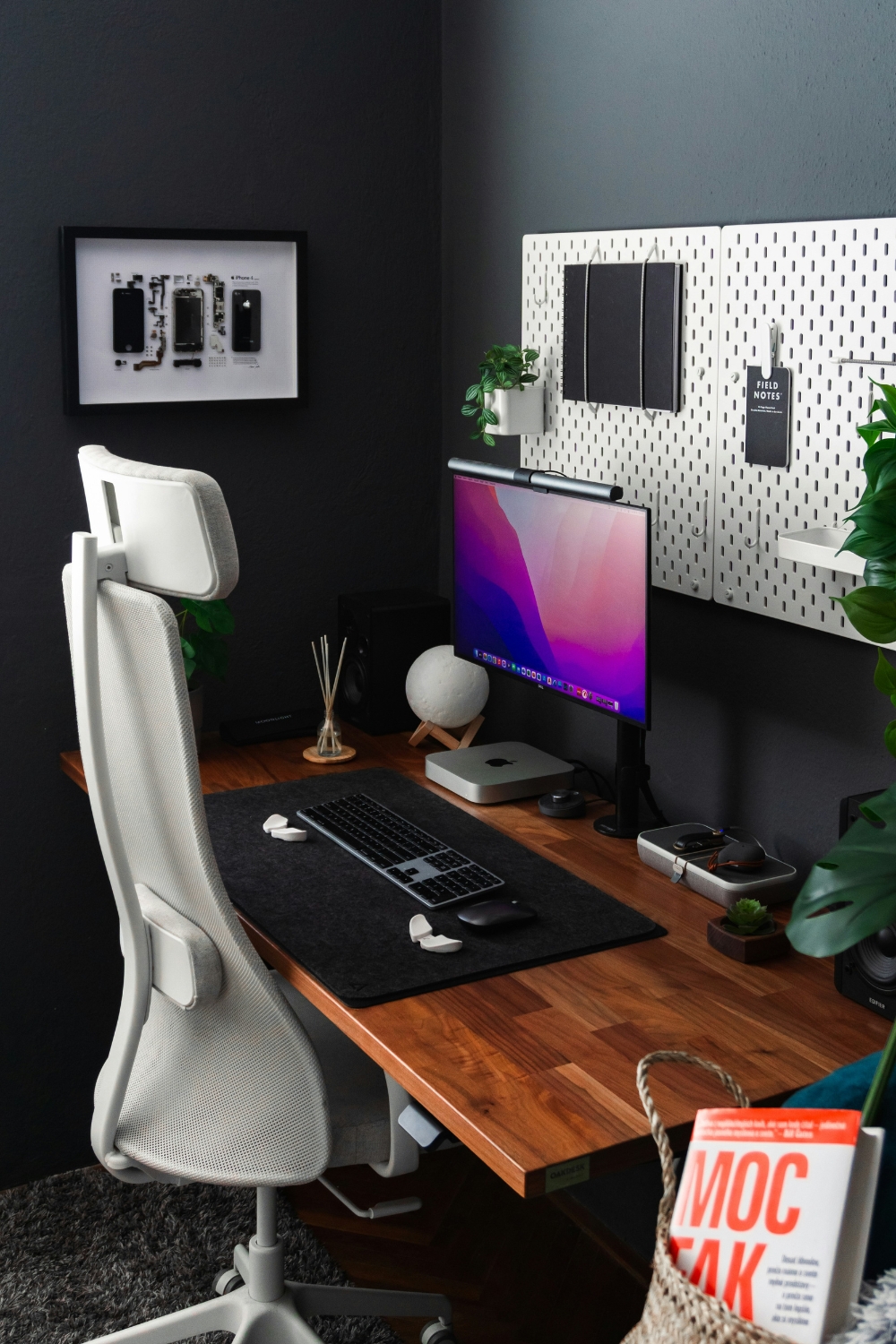 “Modern wall-mounted desk setup in a small apartment with ergonomic chair and minimalist workstation”