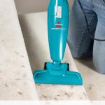 Bissell Featherweight Stick Vacuum Model 2033 in blue with crevice tool